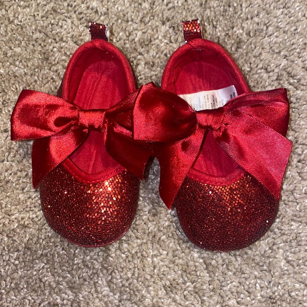 Sparkly red baby shoes